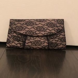 Small lace black clutch